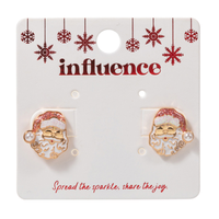 Light pink Santa earrings worn