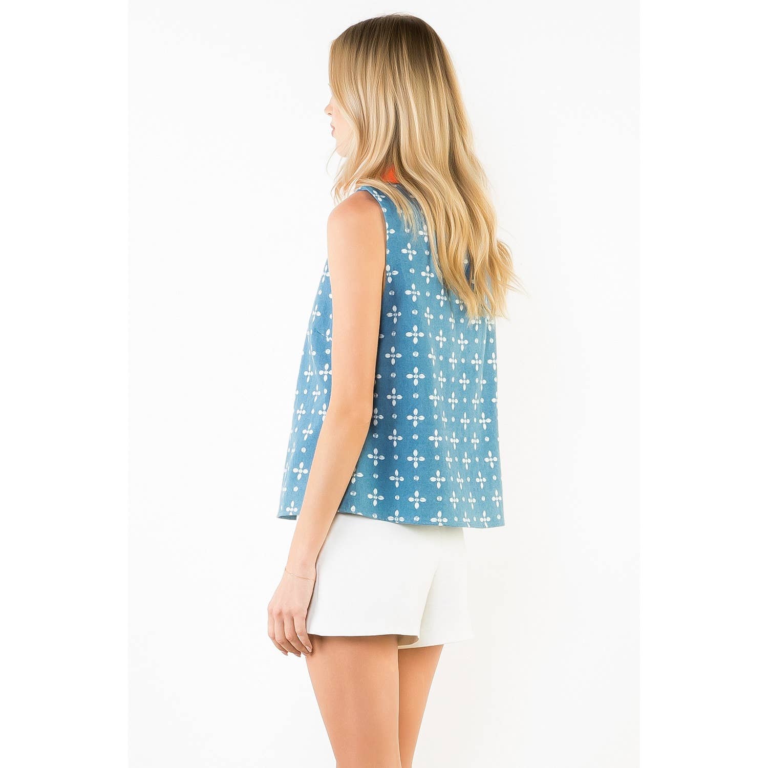 Rhea- sleeveless Floral Pattern V-Neck Top