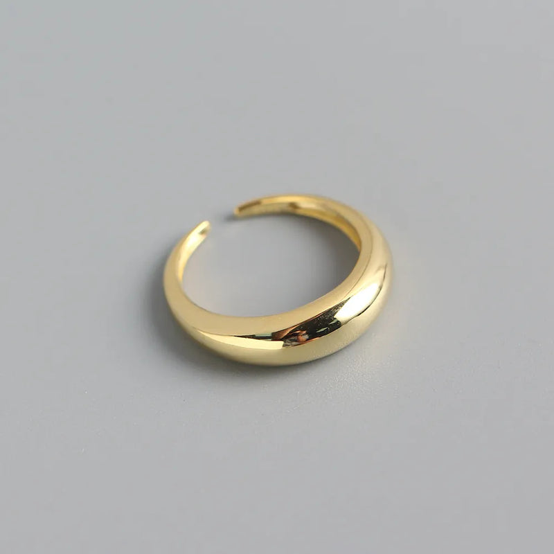 Gold 925 sterling silver minimalist adjustable open ring with a polished golden finish
