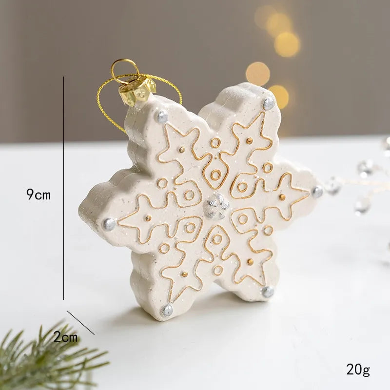 Creamy white and gold snowflake Christmas ornament with textured resin detail