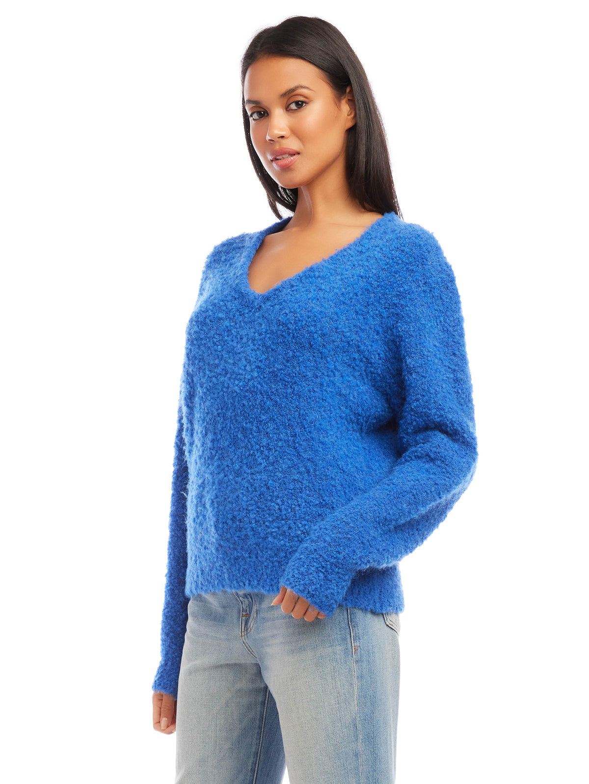Fifteen Twenty V-neck sweater - side view showing the relaxed drop shoulder and ribbed cuffs