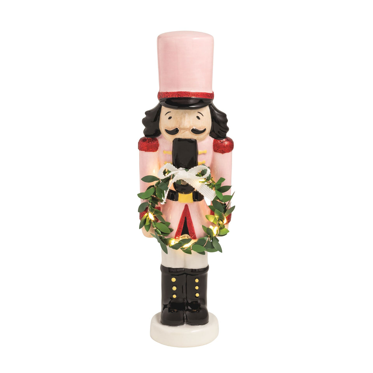 Mud Pie pink ceramic light-up nutcracker sitter holding a green wreath