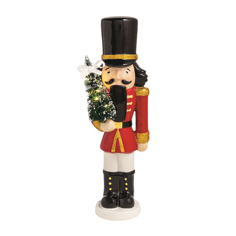 Mud Pie red ceramic light-up nutcracker sitter holding a bottle brush tree