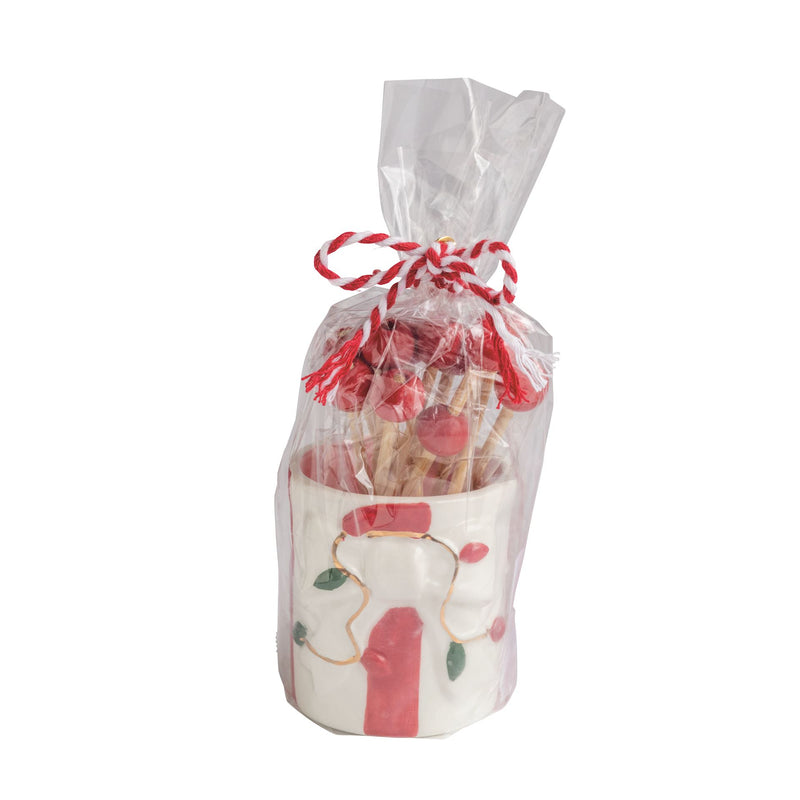 Mud Pie white lights and bow ceramic toothpick caddy with toothpicks in a tied cello bag