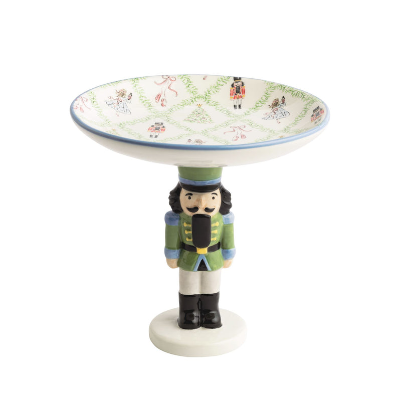 Mud Pie footed candy dish on a green nutcracker pedestal with blue rim