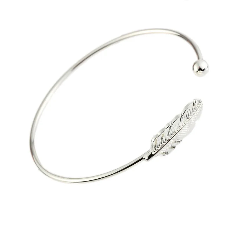 Thick silver feather open cuff bracelet with leaf texture and round bead accent