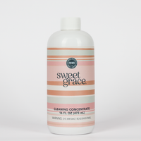 Sweet Grace Cleaning Concentrate 16 fl oz bottle with pink, cream, and gray stripes