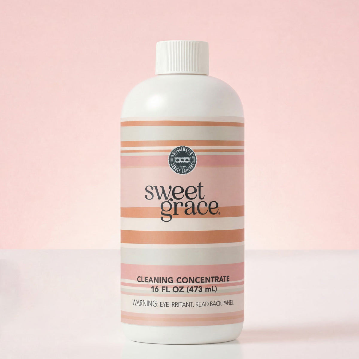 Sweet Grace Cleaning Concentrate bottle against a soft pink background with label detail