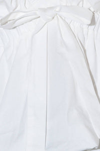 SLOW DOWN IN WHITE WOVEN TOP