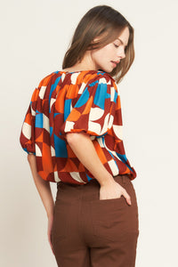 GONE IN A BLINK WOVEN TOP