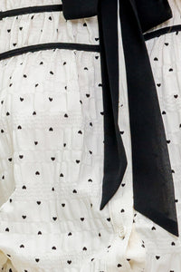 ROMANCE STITCH IVORY WOVEN TOP