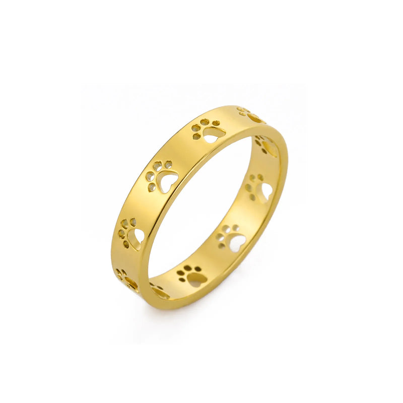 Gold stainless steel ring with cute hollow paw print cutouts for pet lovers