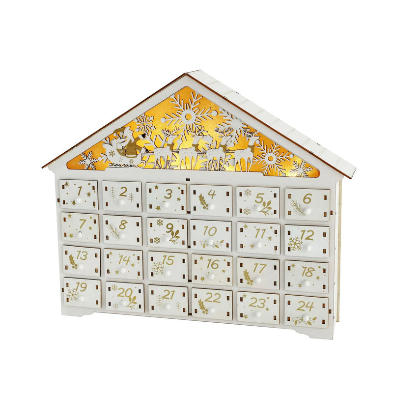 White wooden 24-day Christmas advent calendar house with numbered drawers and warm LED lighting