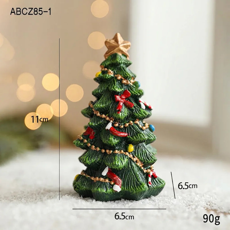 Miniature hand-painted resin Christmas tree figurine with gold star and red bows
