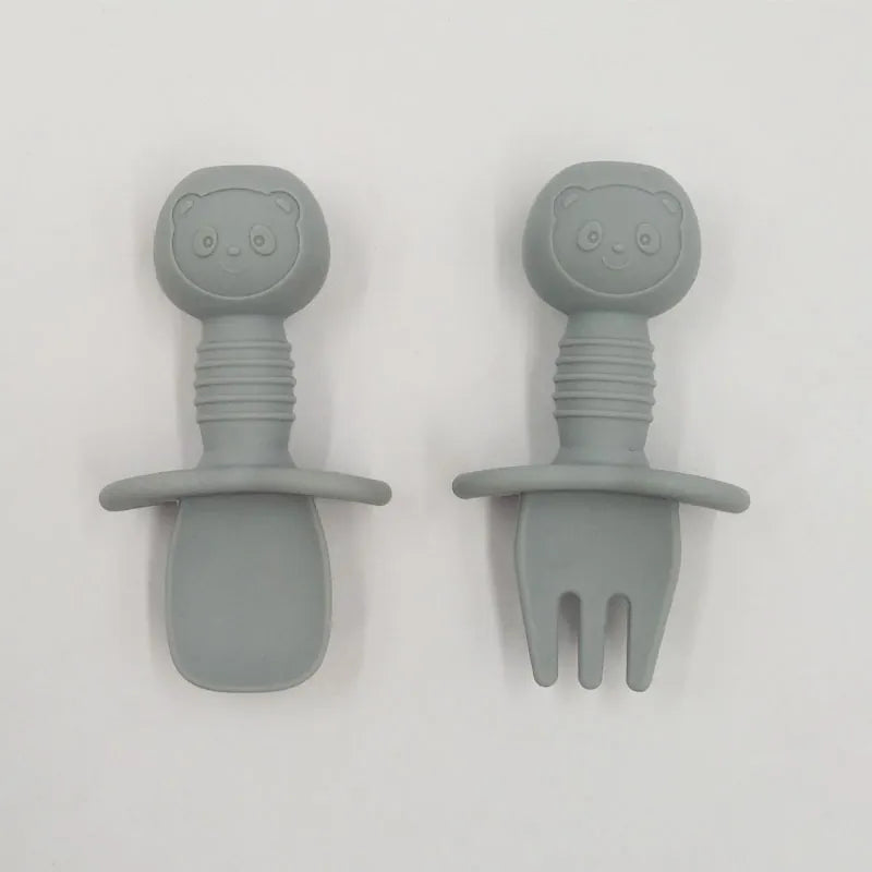 Gray food-grade silicone baby training fork and spoon set with panda handles and anti-choke guard
