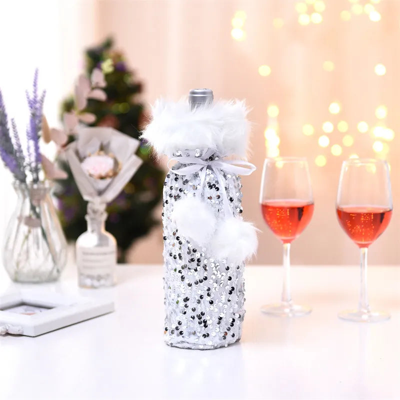 Silver sequin Christmas wine bottle cover with white faux fur trim and pom-poms