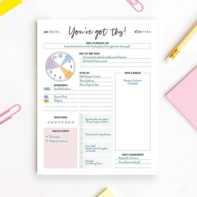Daily planner memo pad with tear-off to-do list and hourly schedule layout