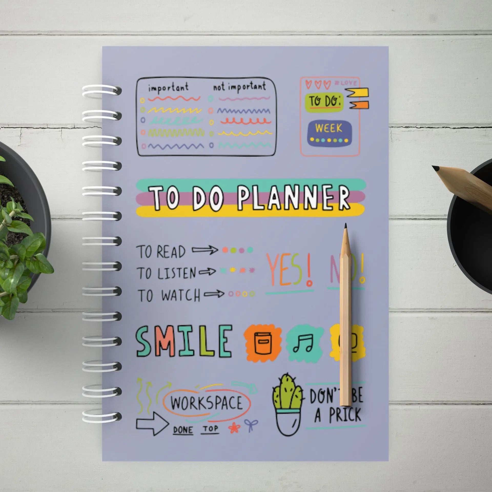 Cute purple A5 spiral undated daily planner with hand-drawn cartoon cover