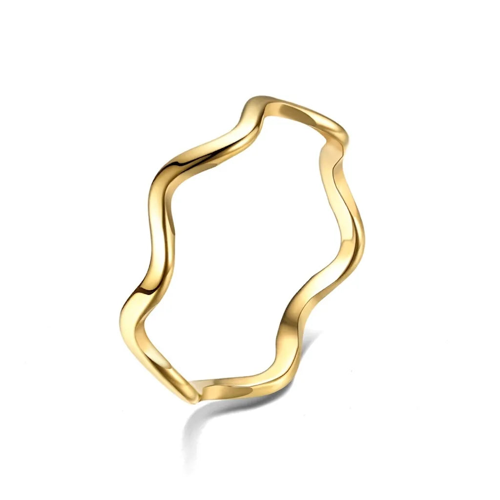 Gold minimalist wavy stainless steel stackable ring with a polished mirror finish