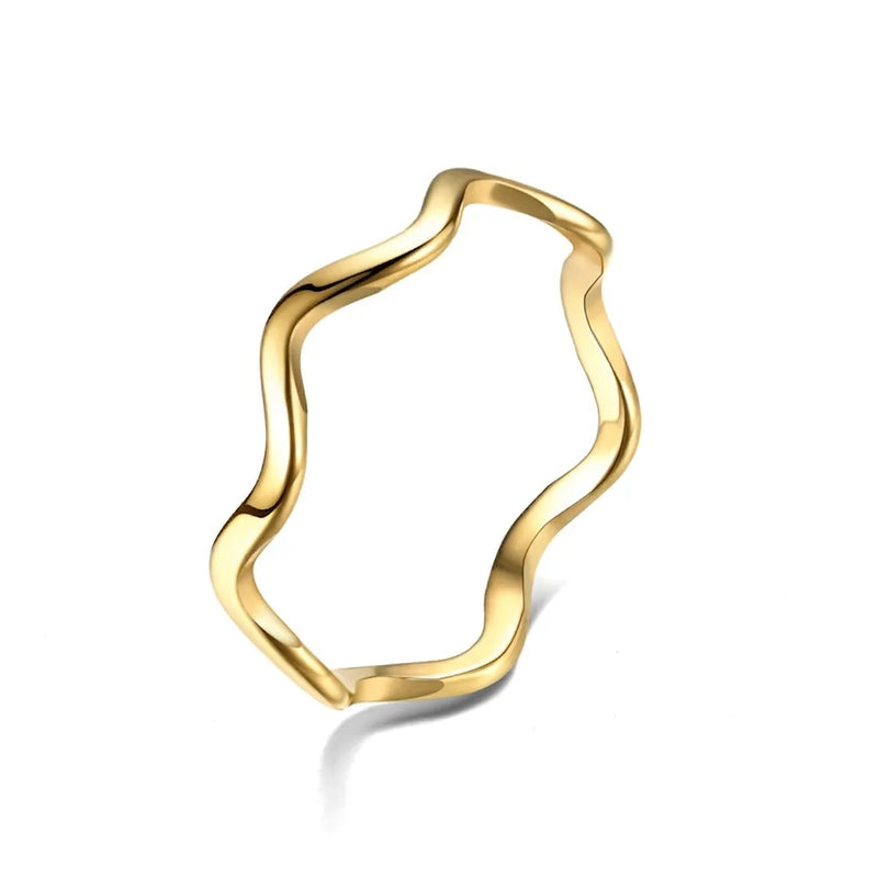 Gold minimalist wavy stainless steel stackable ring with a polished mirror finish
