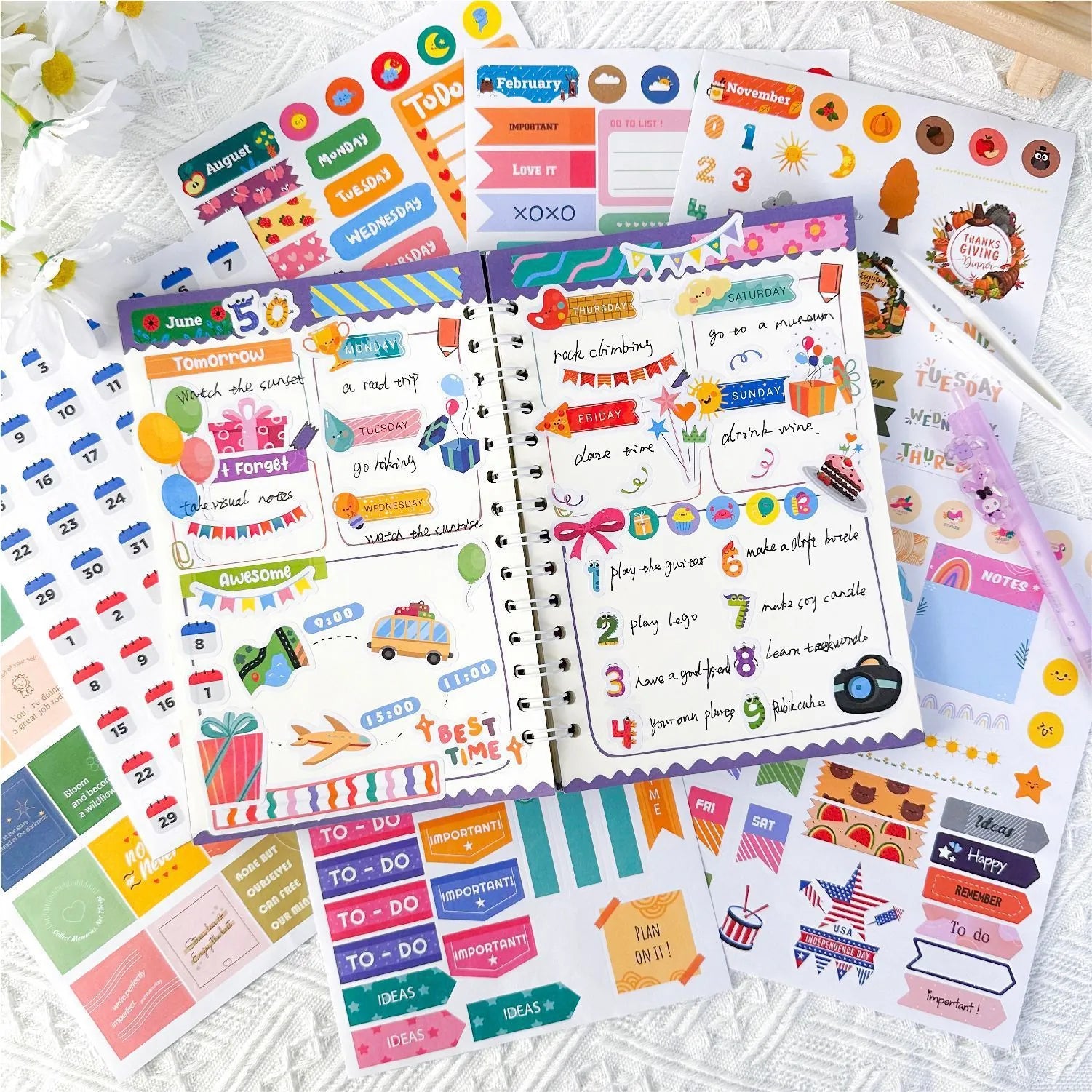 A5 undated spiral planner shown with colorful functional sticker sheets
