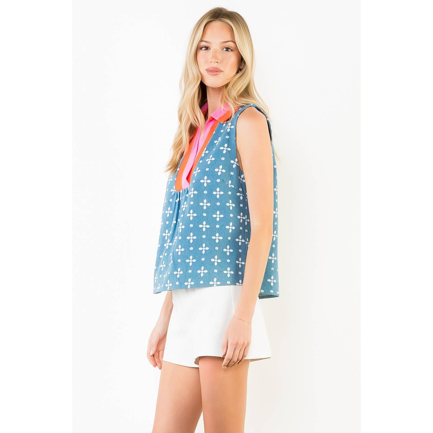 Rhea- sleeveless Floral Pattern V-Neck Top