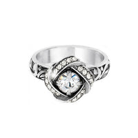 Brighton silver-plated ring with central crystal solitaire, knotted crystal-pave surround, and scrollwork band