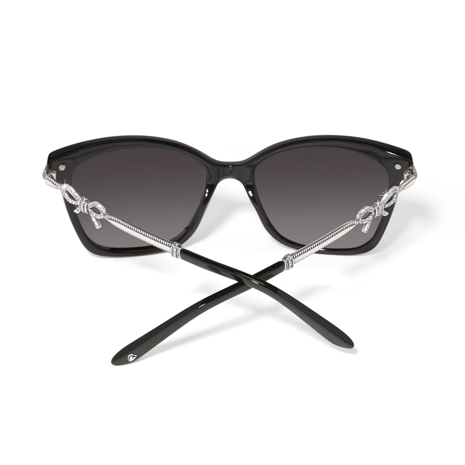 Brighton black sunglasses shown from the back with silver-tone crystal bow accents and engraved temples