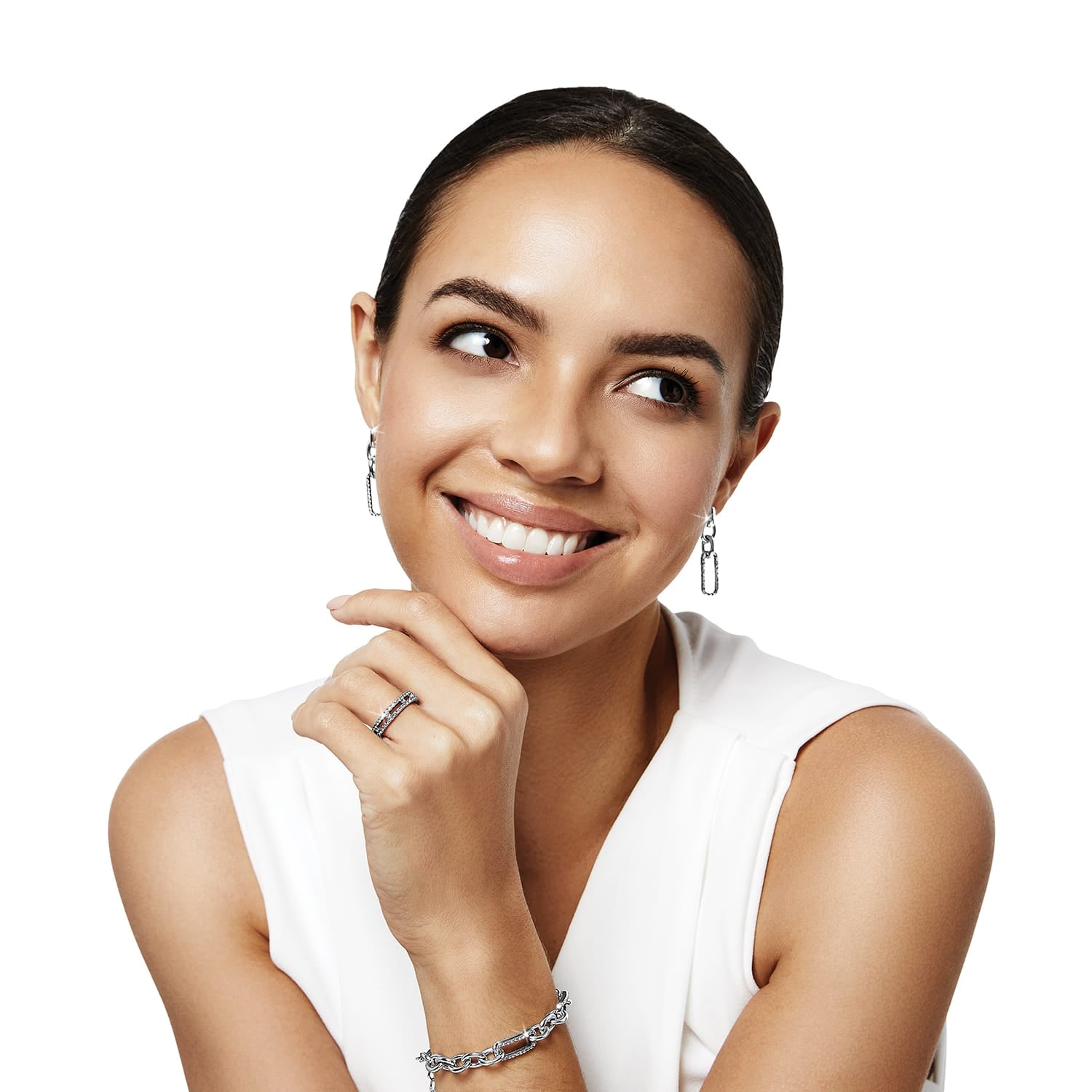 Model wearing Brighton silver-plated drop earrings with rectangular links, coordinating crystal ring, and chain link bracelet