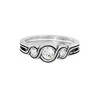 Brighton silver-plated ring with three crystals and swirling scroll detail along the band