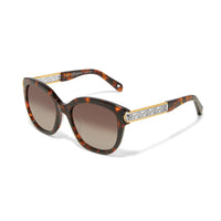 Brighton sunglasses with tortoise frames, brown gradient lenses, and silver and gold scrollwork temple accents