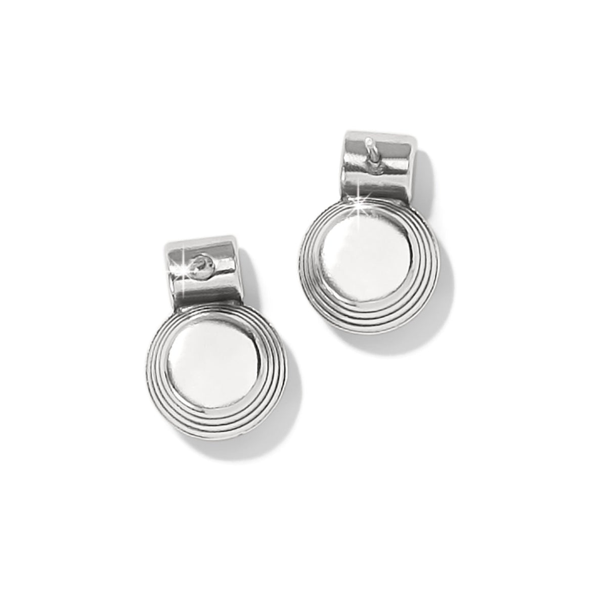Brighton drop earrings with silver-plated circular pendants and concentric ridged detailing on a white background