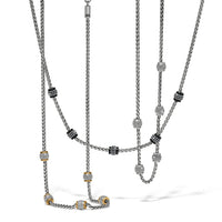 Meridian Petite Short Necklace layered with silver, gold, and black lacquer options