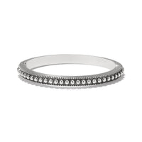 Brighton silver-plated bangle bracelet with row of polished beads and milgrain edge detailing on a white background