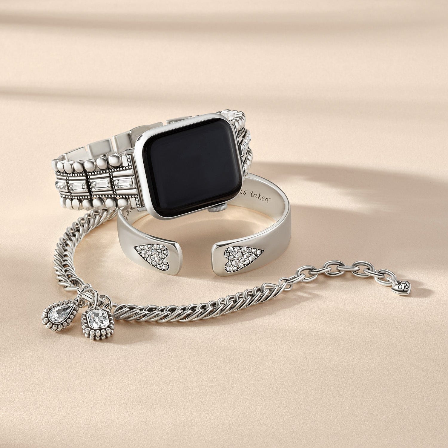 Silver smartwatch with Pretty Tough Gem Watch Band and charm